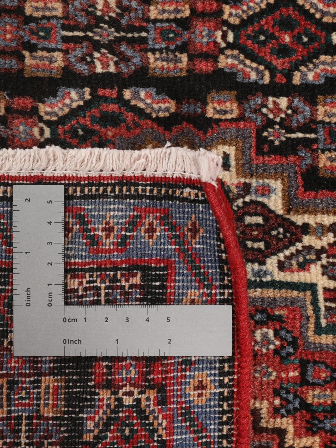 Hand-knotted Senneh rug from the Middle East in multicolor