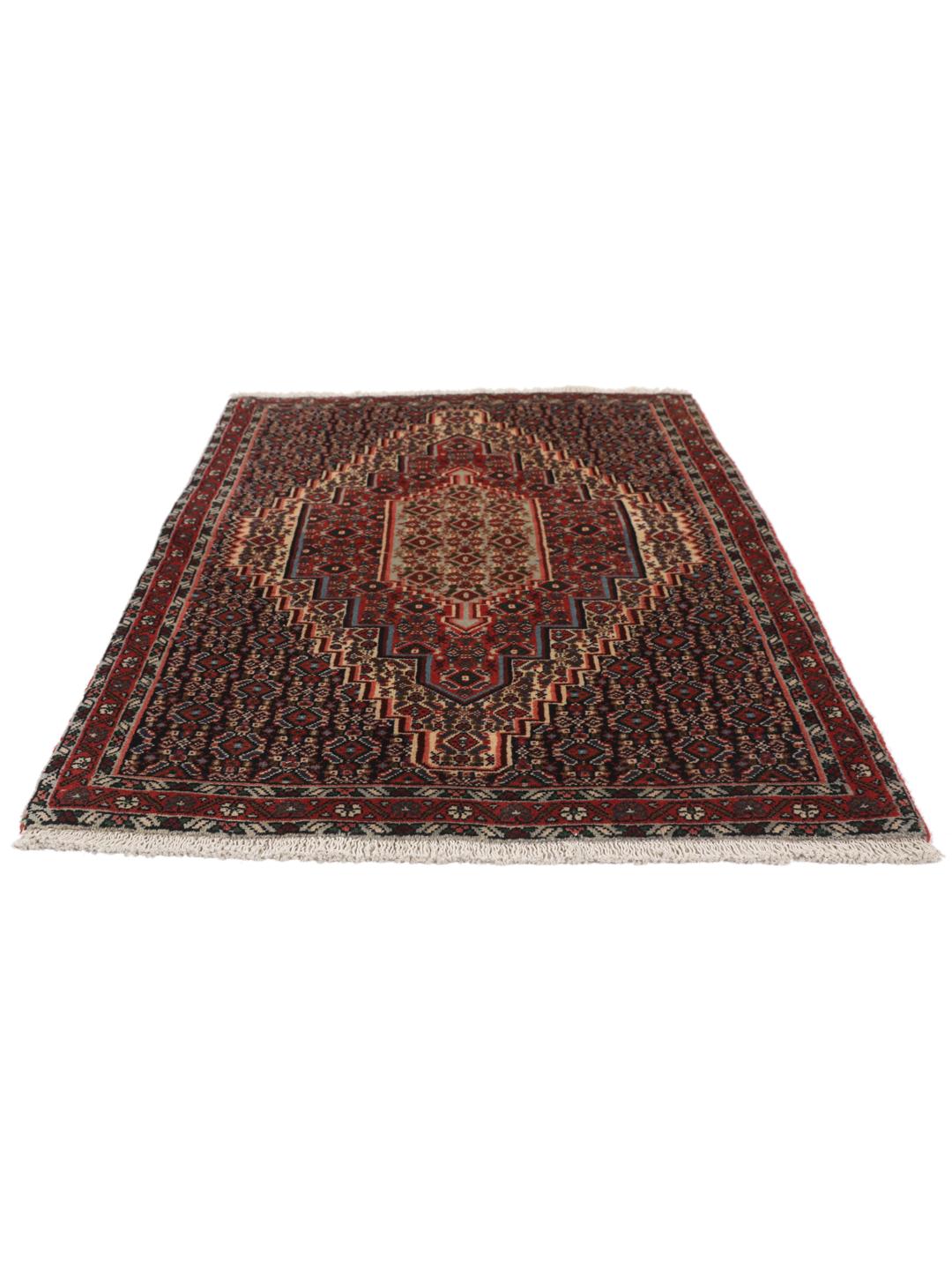 Hand-knotted Senneh wool rug in red with intricate geometric medallion patterns