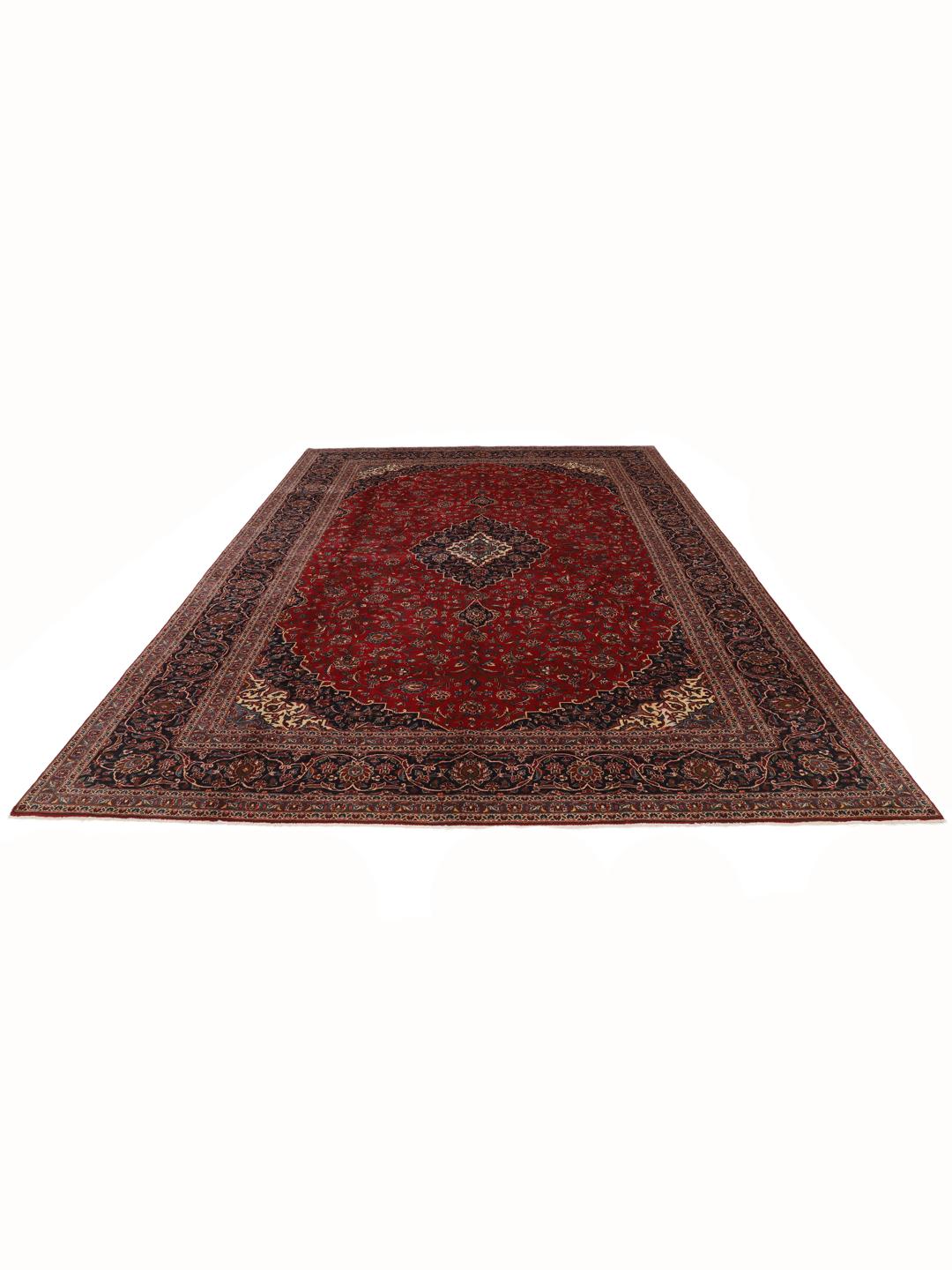 Hand-knotted Keshan rug from the Middle East in dark-red and blue