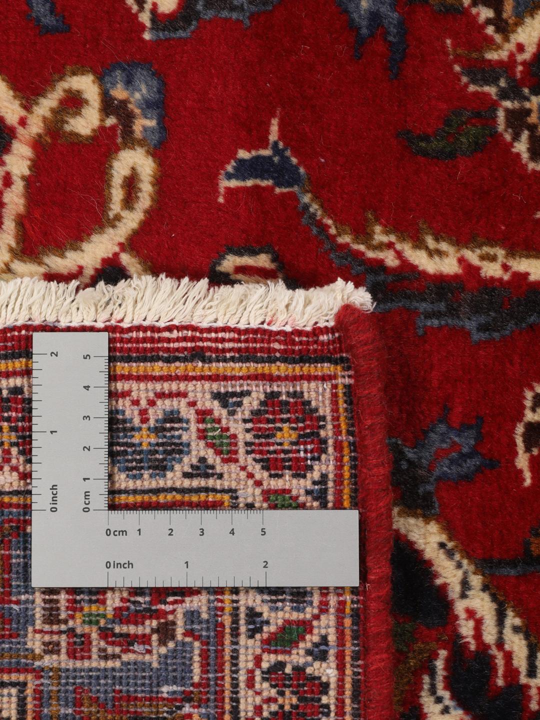 Hand-knotted Keshan rug from the Middle East in dark-red and blue