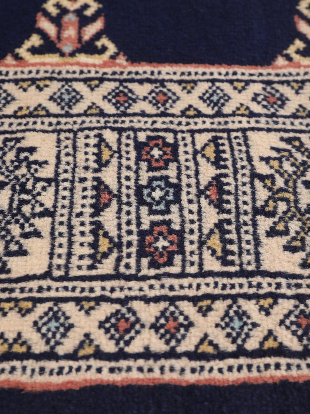Hand-knotted Pakistan Bokhara runner in dark-blue with geometric motifs