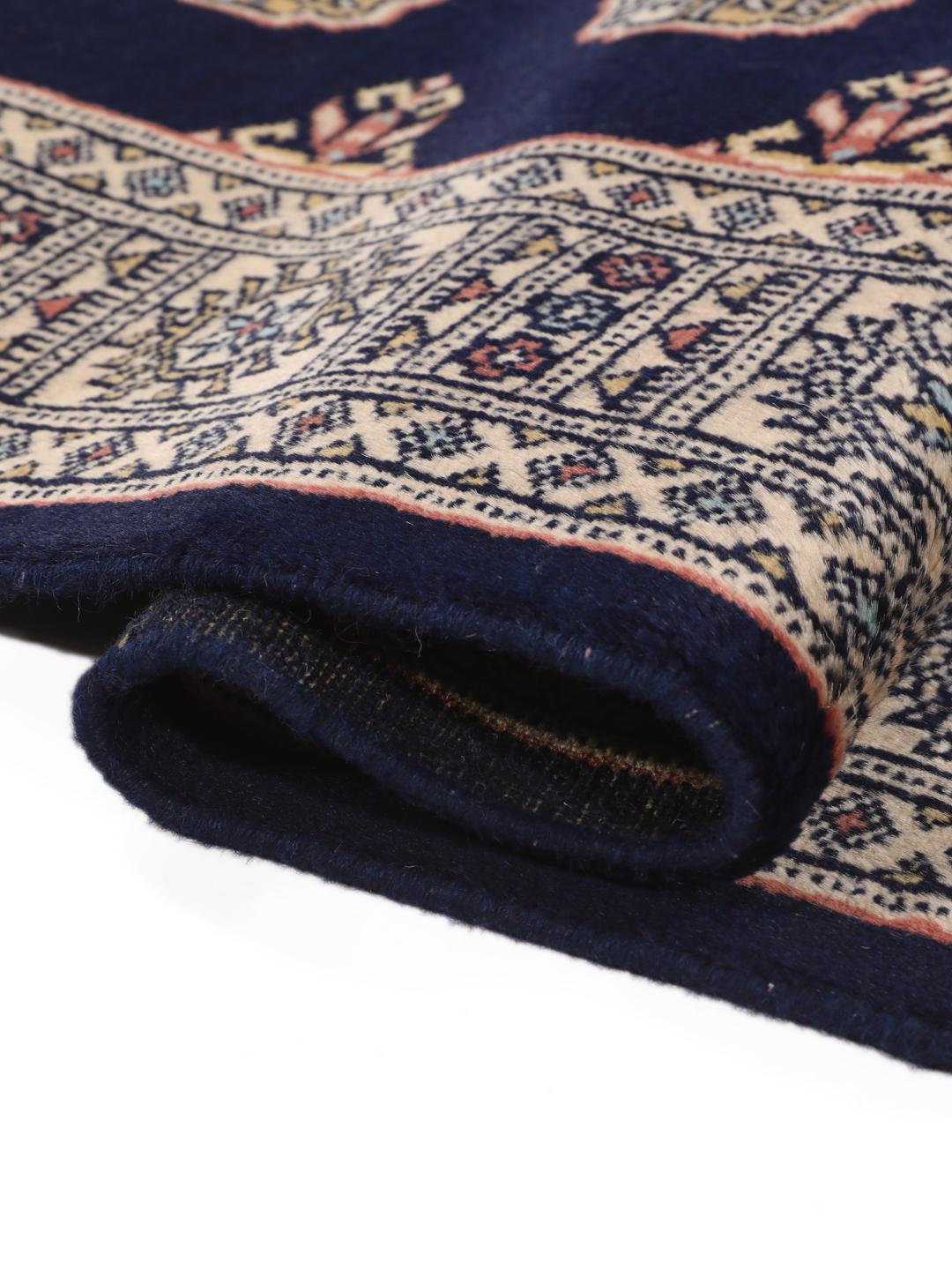Hand-knotted Pakistan Bokhara runner in dark-blue with geometric motifs