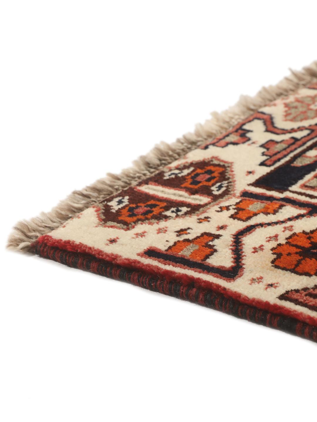 Hand-knotted Shiraz rug from the Middle East featuring a red and black geometric design