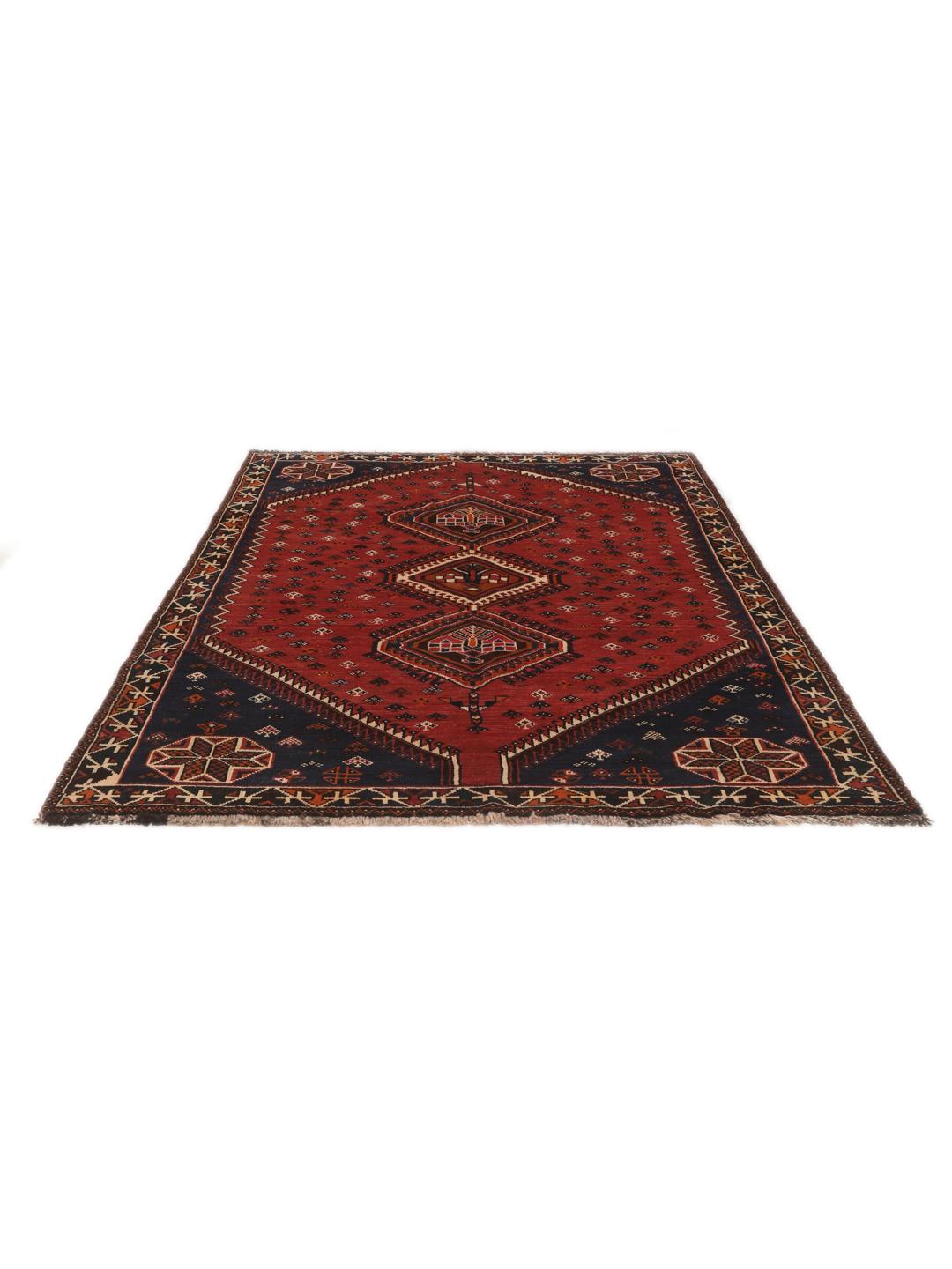 Hand-knotted Shiraz rug from the Middle East in red and navy blue