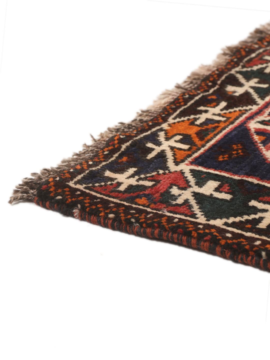 Hand-knotted Shiraz rug from the Middle East in red and navy blue