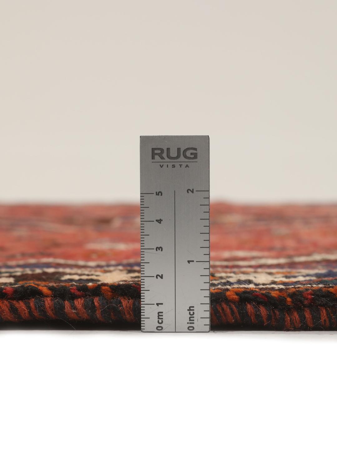 Hand-knotted Shiraz rug from the Middle East in red and navy blue