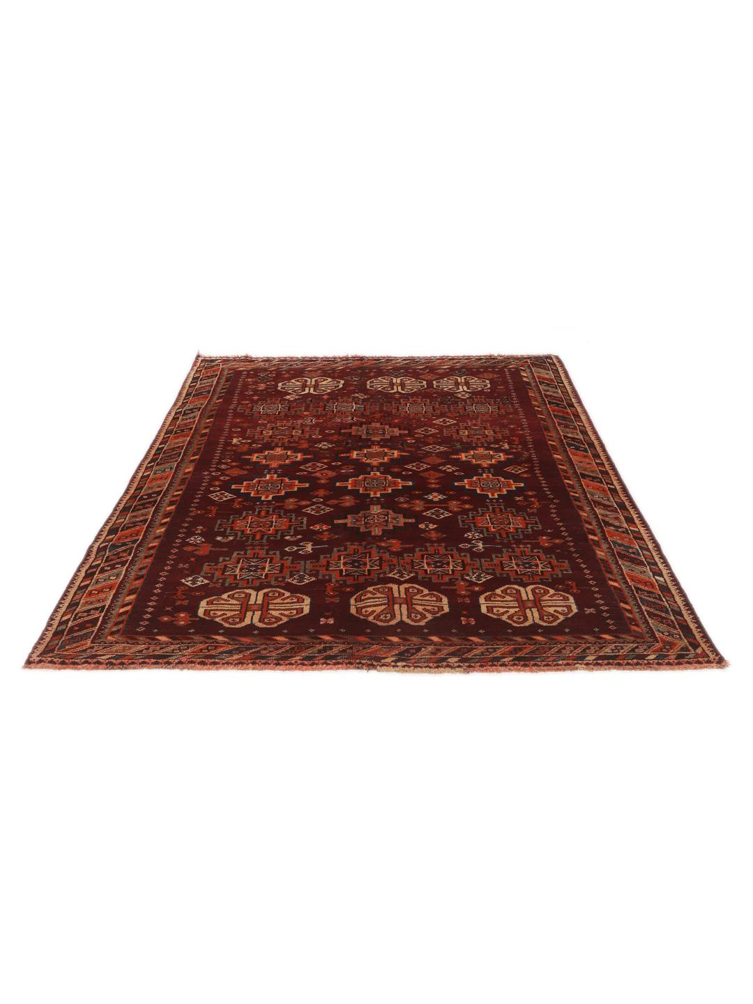 Hand-knotted Qashqai rug from the Middle East featuring geometric patterns in dark red and multicolour wool.