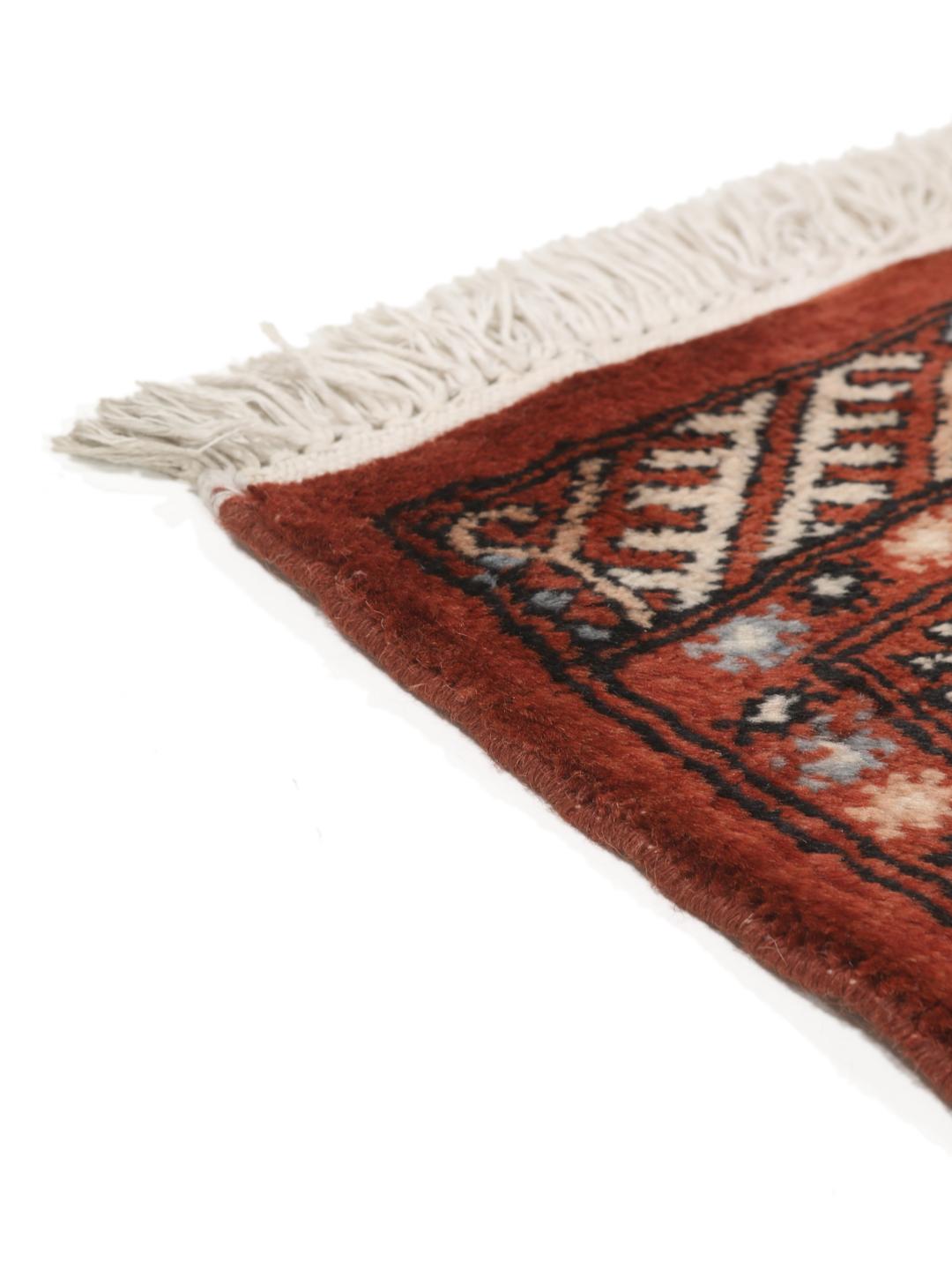 Hand-knotted Pakistan Bokhara runner in deep red