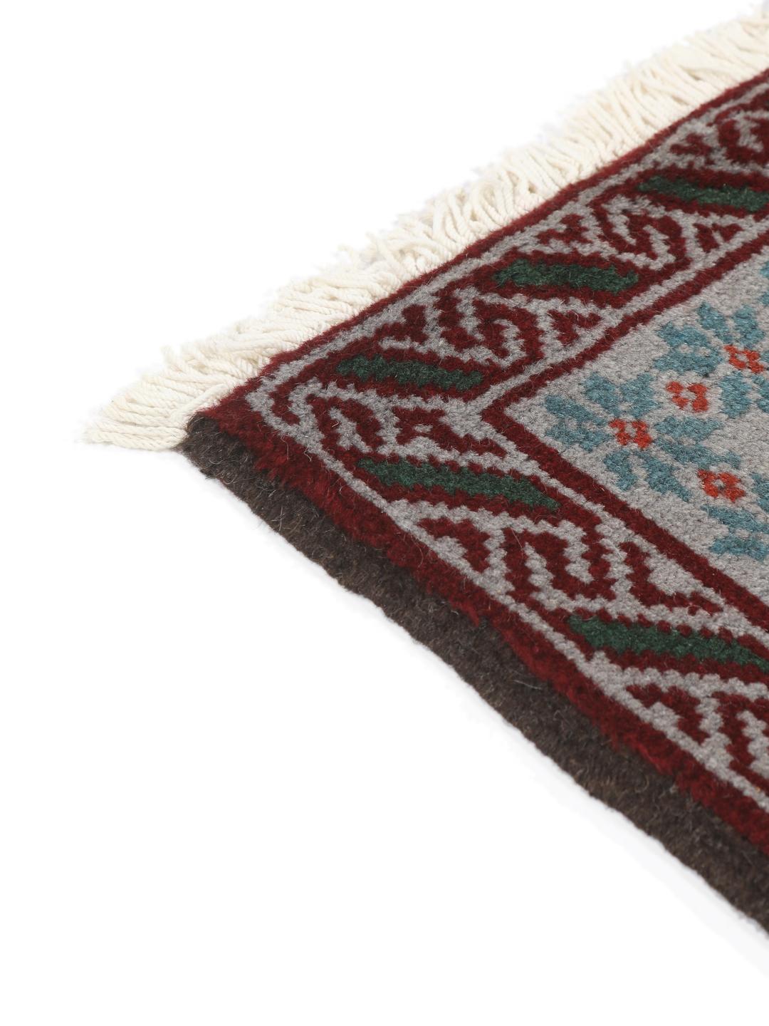 Hand-knotted Middle Eastern Baluch rug in red and grey wool