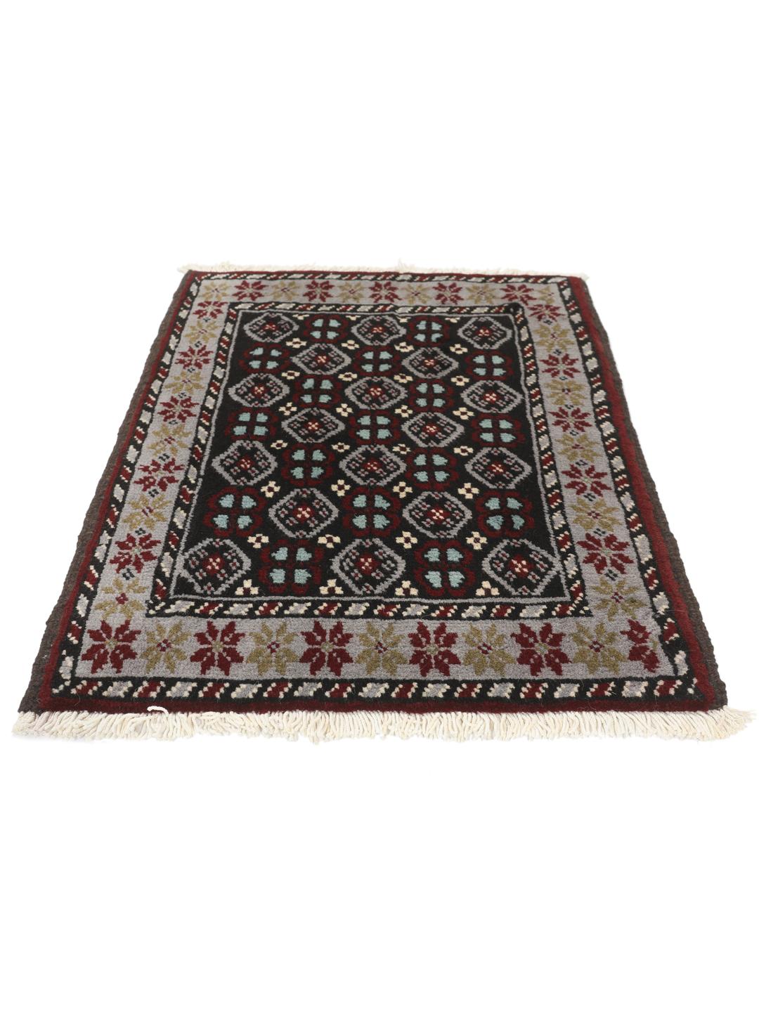 Hand-knotted Beluch rug with geometric patterns in multicolor from the Middle East