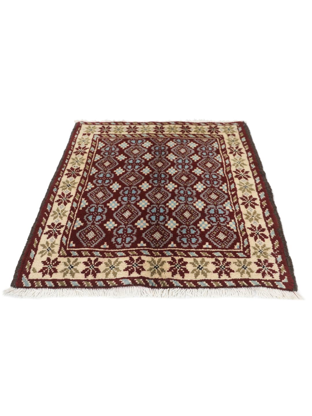 Hand-knotted Beluch rug with geometric motifs in red, blue, and cream