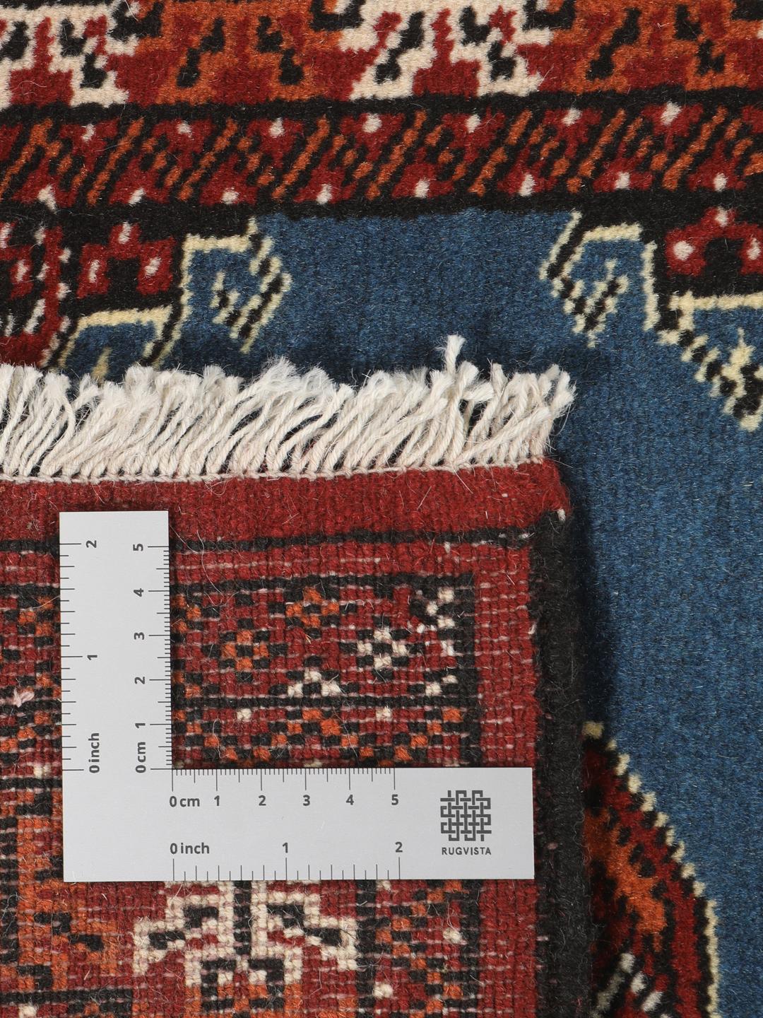 Hand knotted blue Turkaman rug from the Middle East