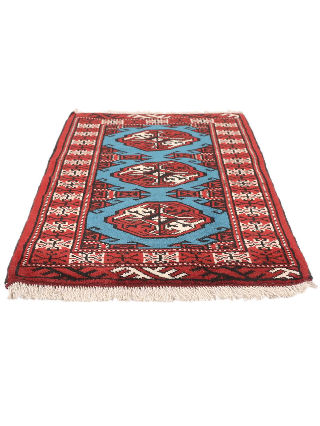 Hand-knotted Turkaman rug from the Middle East in red and blue tones
