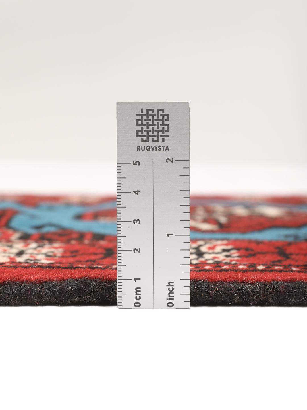 Hand-knotted Turkaman rug from the Middle East in red and blue tones