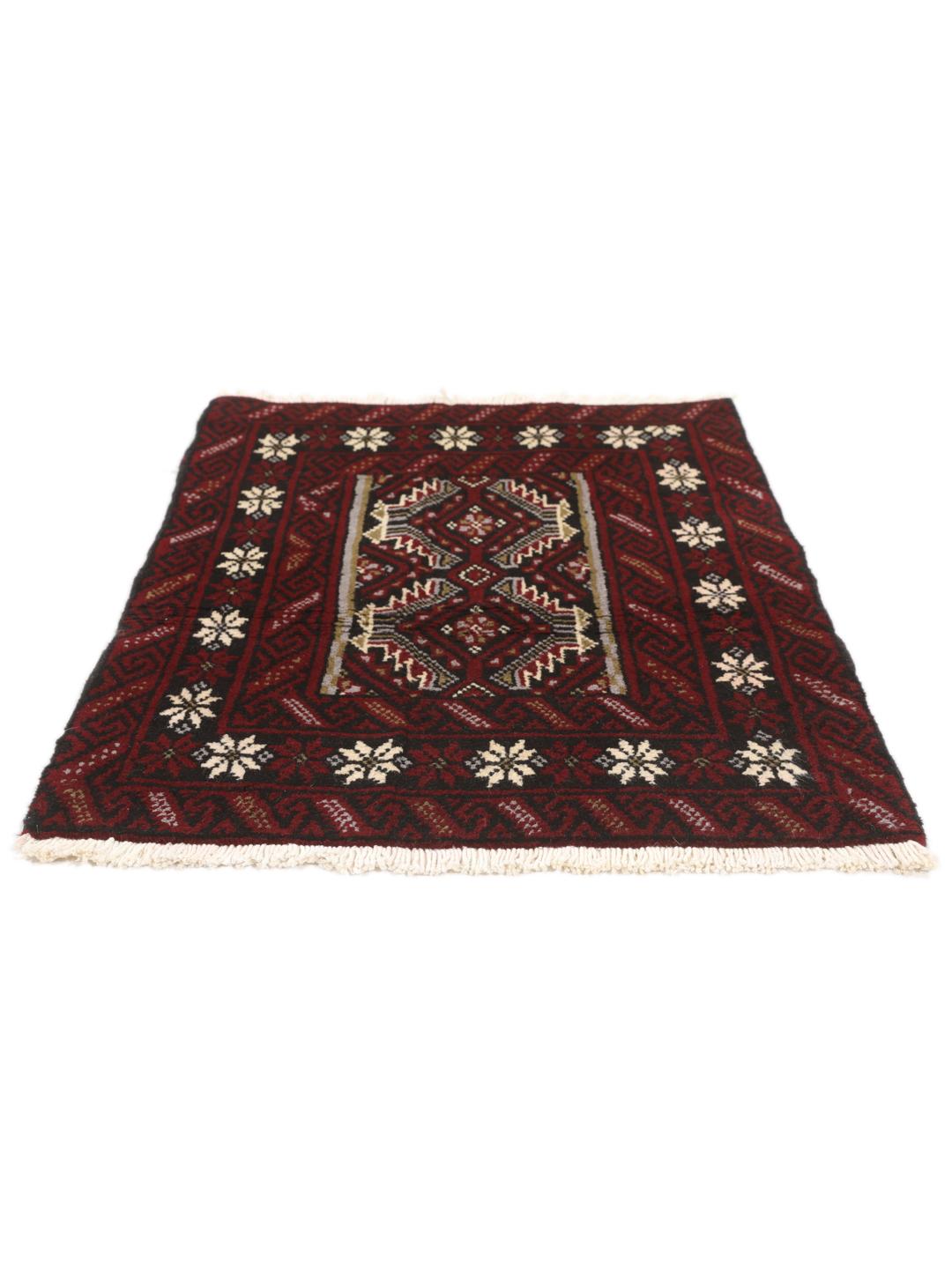 Hand-knotted Middle Eastern Beluch rug in dark red with floral and geometric patterns.