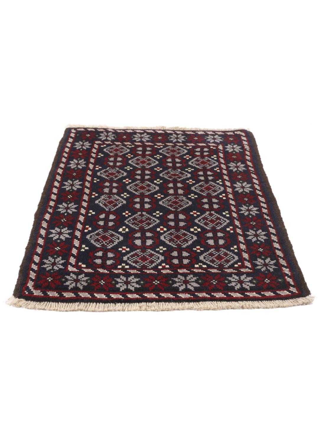 Handmade Baluch rug from the Middle East in dark-blue and dark-red tones.