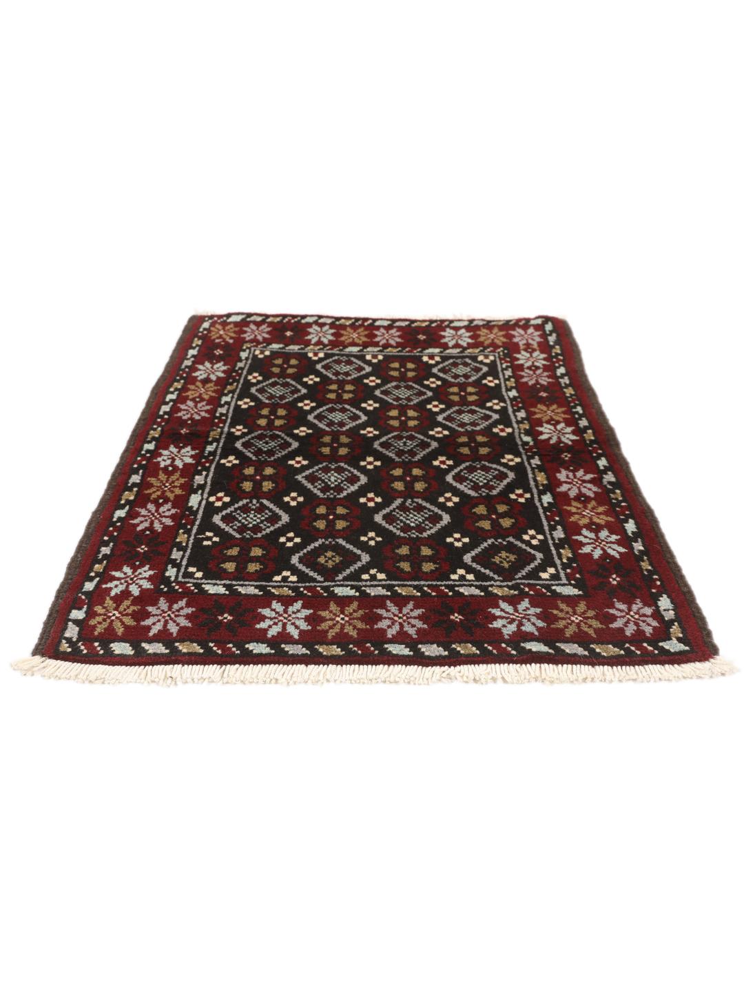 Hand-knotted Baluch rug in dark-red and black with traditional tribal geometric patterns