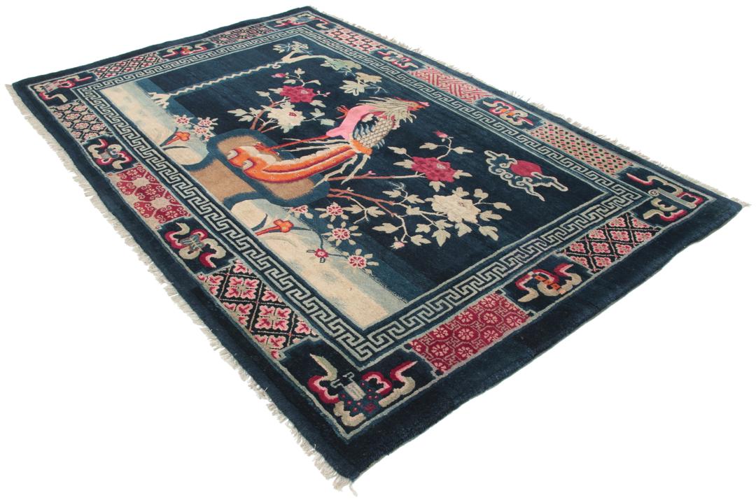 Antique Chinese Art Deco rug featuring a phoenix motif in dark-blue and pink