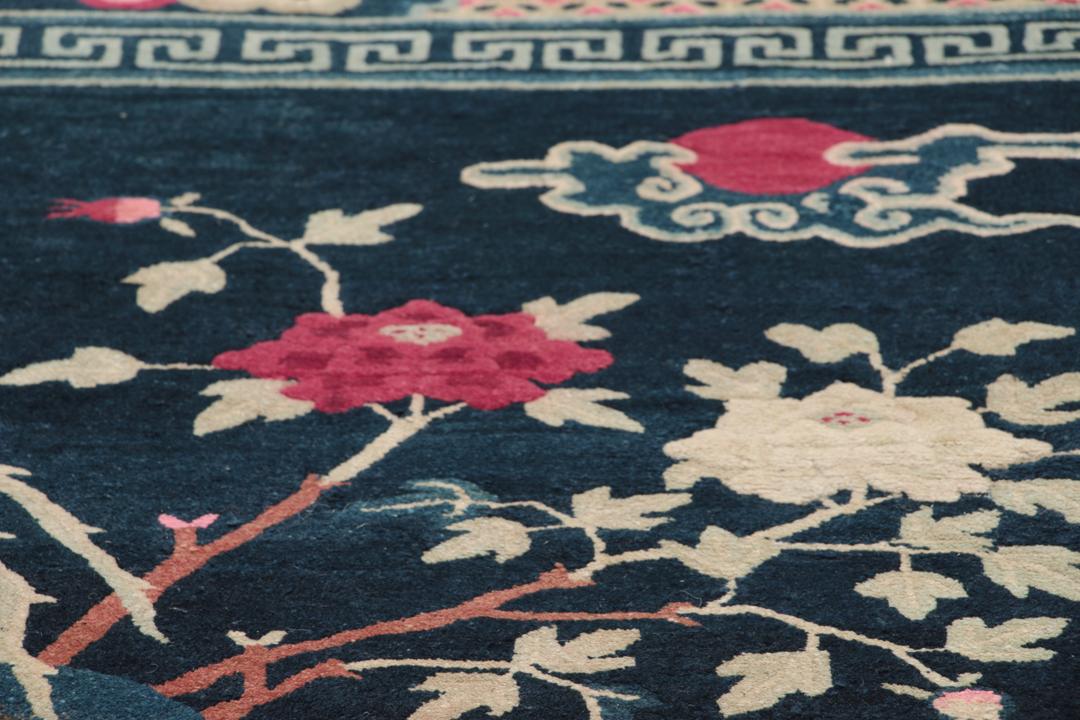 Antique Chinese Art Deco rug featuring a phoenix motif in dark-blue and pink