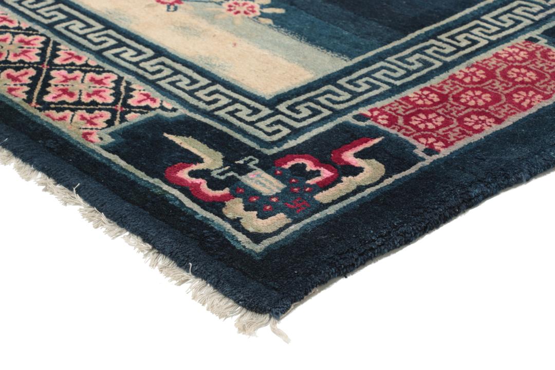 Antique Chinese Art Deco rug featuring a phoenix motif in dark-blue and pink