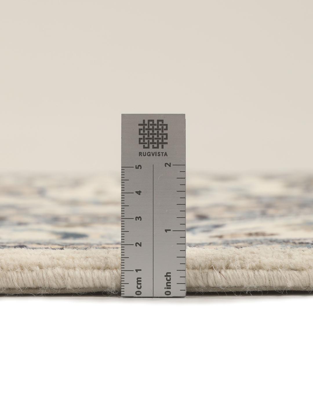Handgemaakt Nain-tapijt uit het Midden-Oosten met een beige en blauw bloemmotief