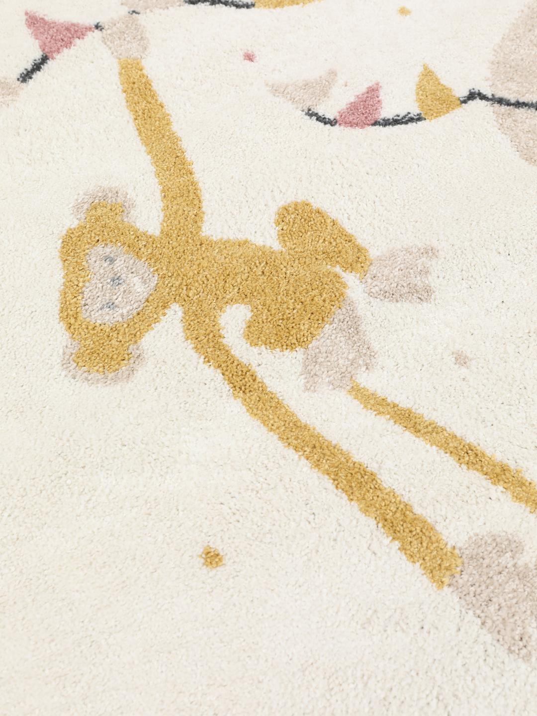 A playful circus-themed rug featuring a pink elephant and a monkey on an off-white background