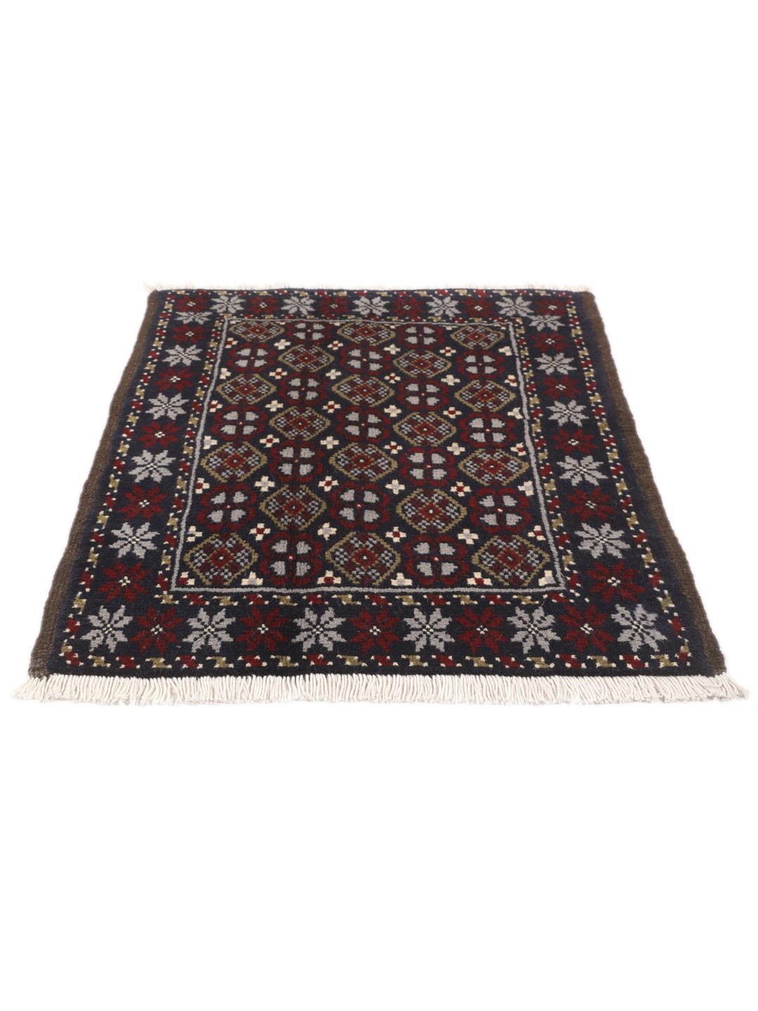 Ein handgeknüpfter Beluch-Teppich aus dem Nahen Osten mit einem tiefdunkelblauen und roten geometrischen Muster