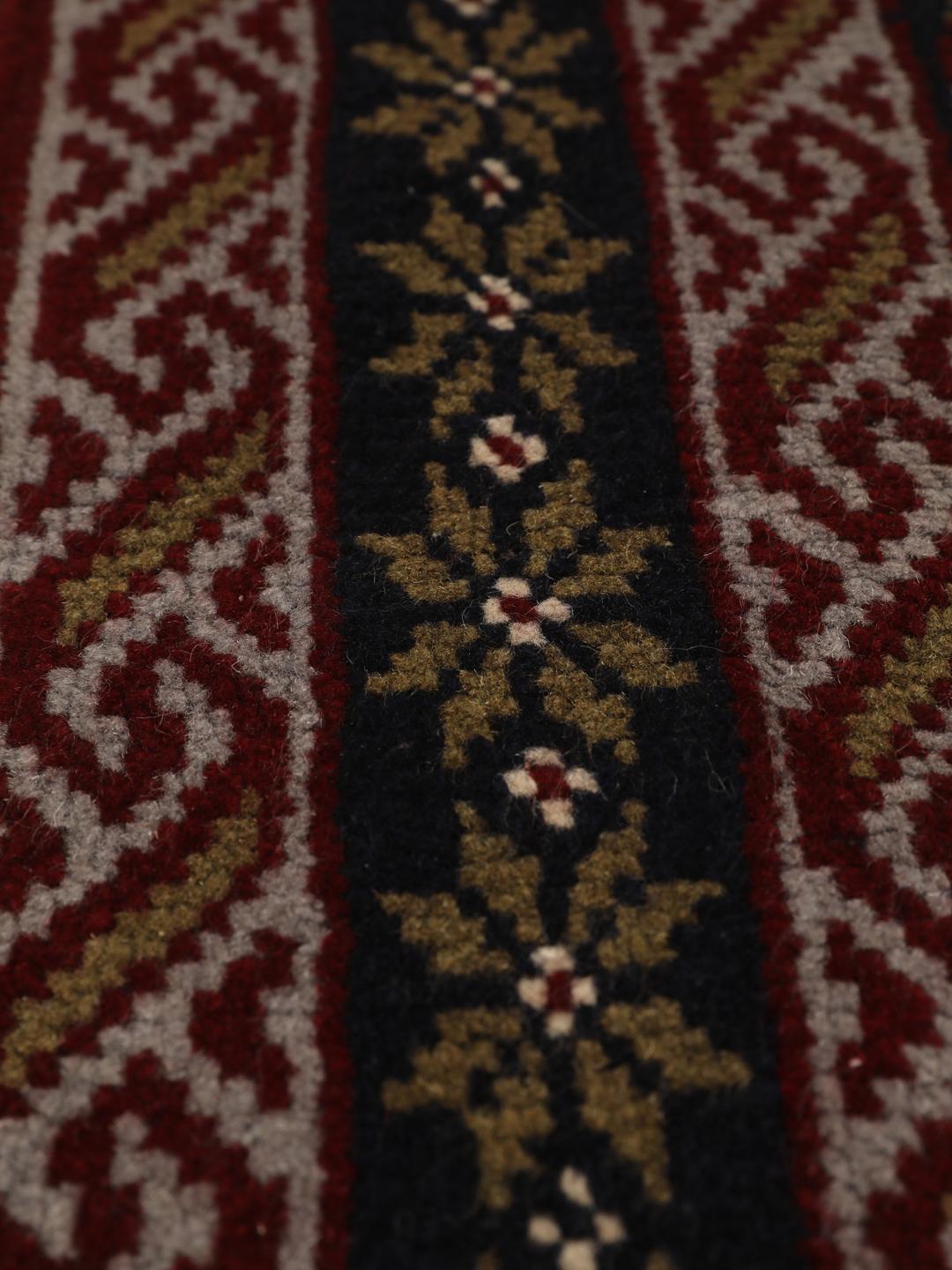 Hand-knotted Middle Eastern Baluch rug in dark-red and dark-blue Wool