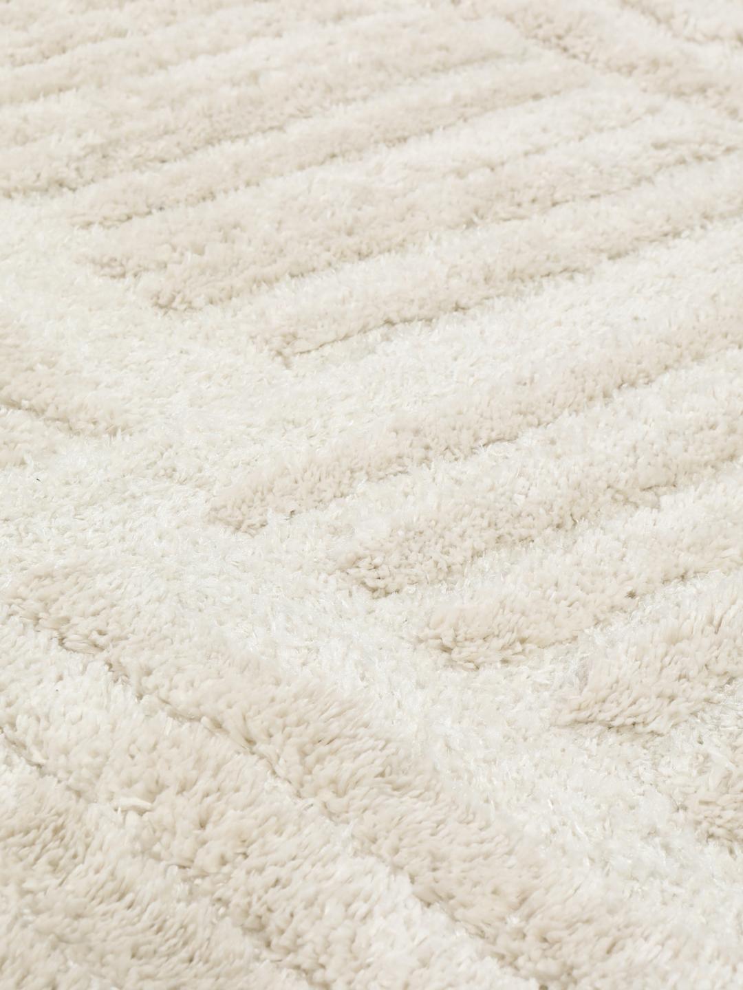Offwhite tapijt met hoge en lage pooltextuur