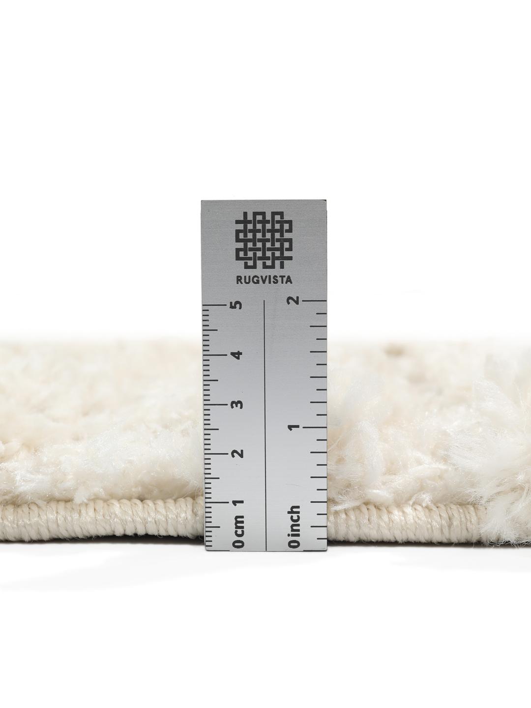 Offwhite tapijt met hoge en lage pooltextuur