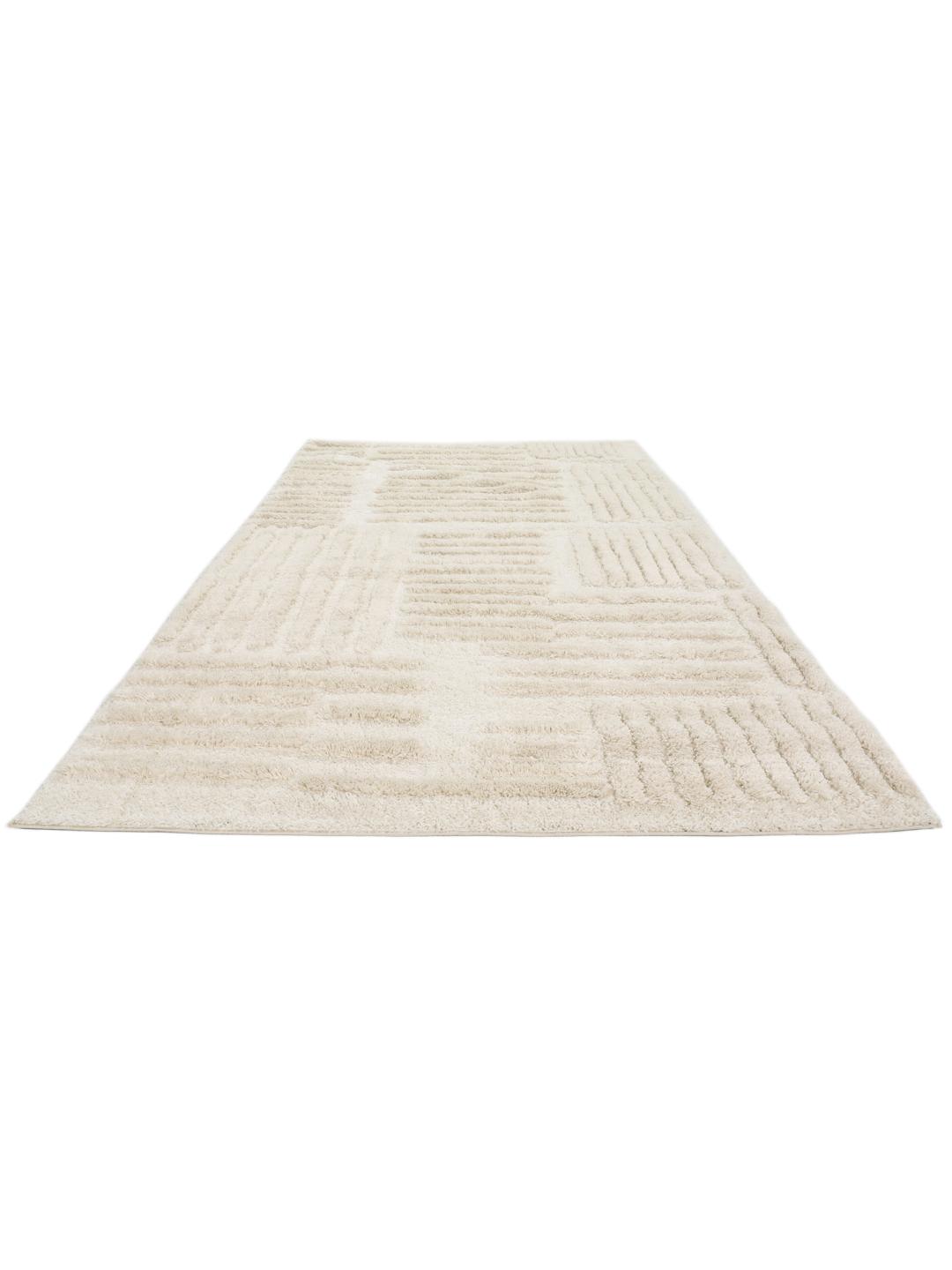Offwhite tapijt met hoge en lage pooltextuur