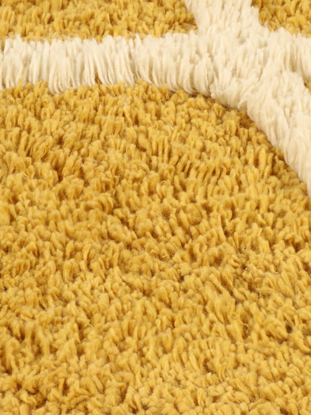 Tapis de bain rond à motif jaune et blanc