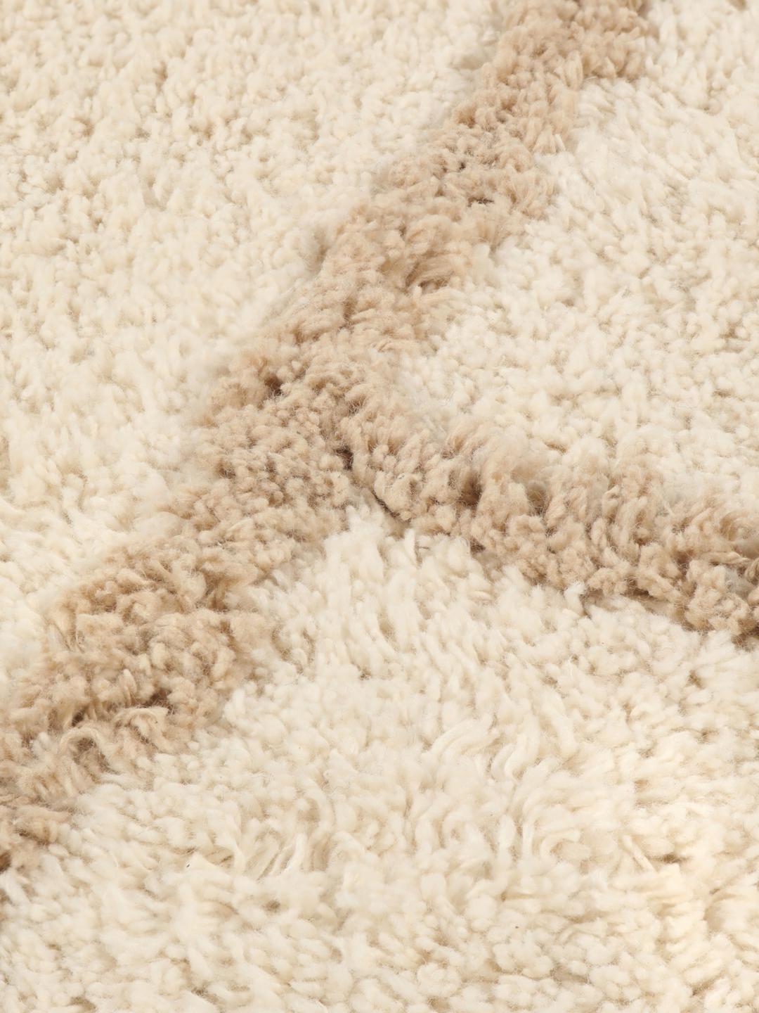 Tapis de bain rond beige et blanc à motif géométrique