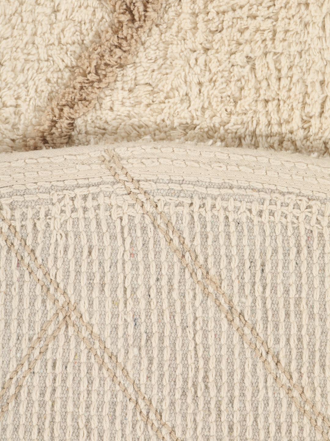 Tapis de bain rond beige et blanc à motif géométrique
