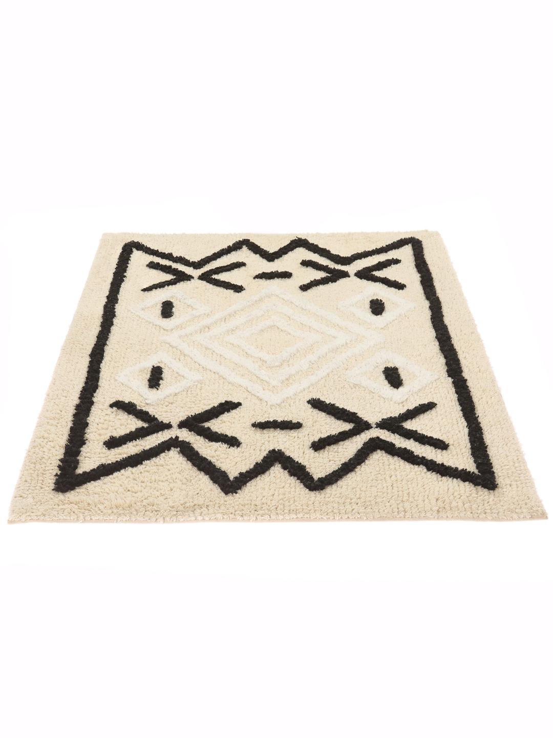 Tapis de bain en blanc naturel