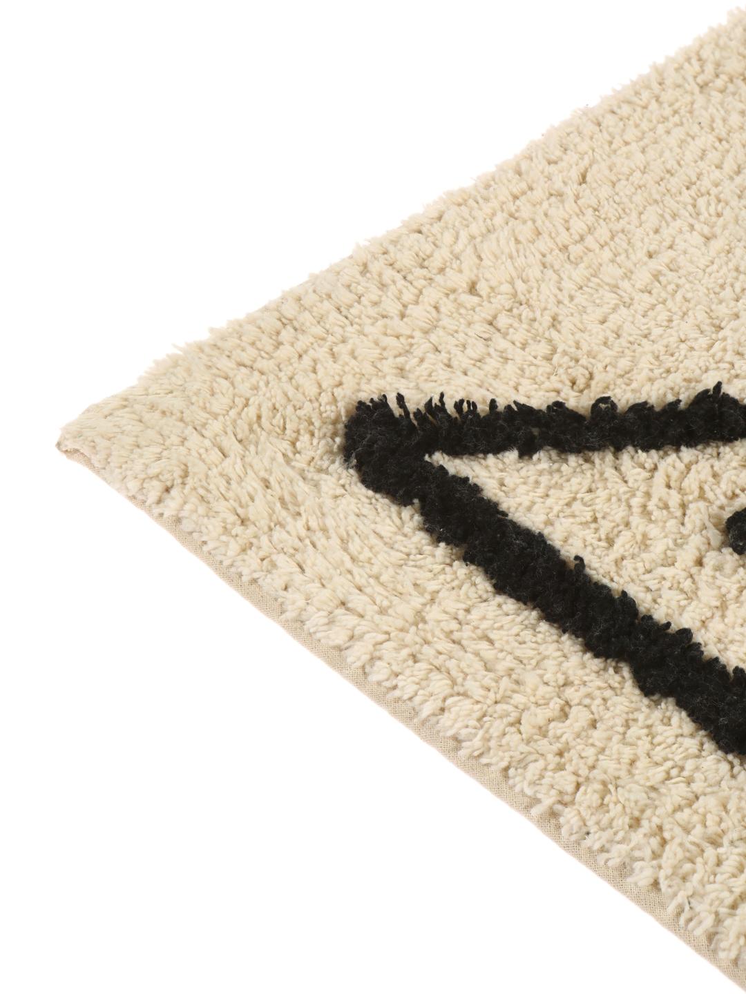 Tapis de bain en blanc naturel