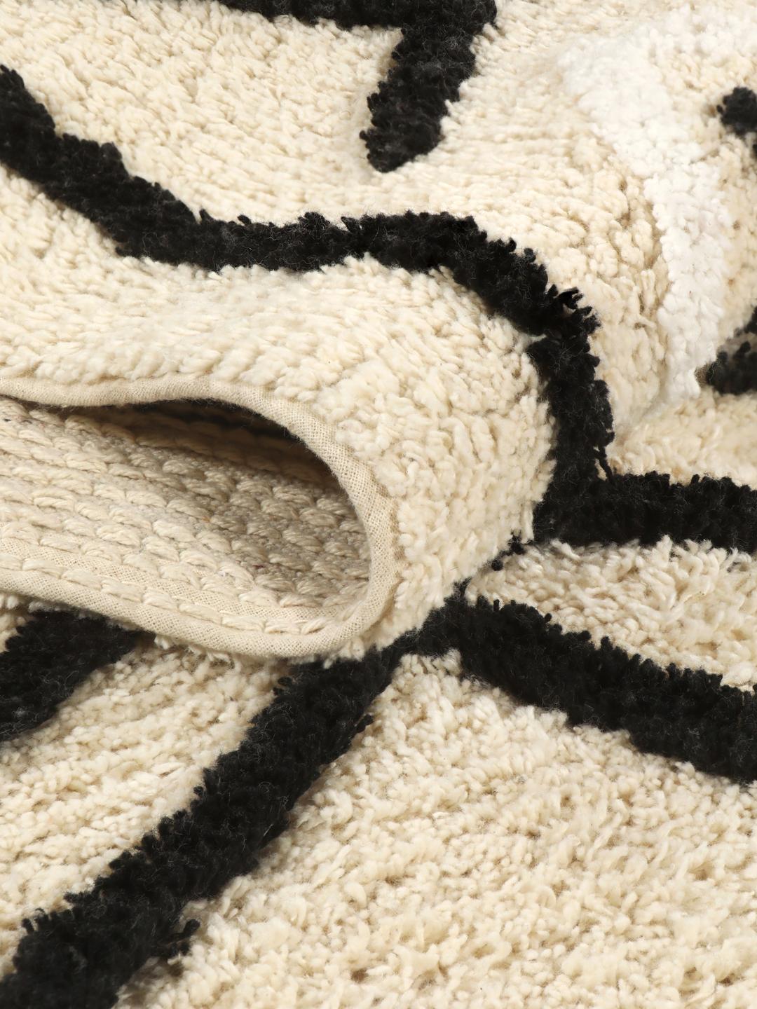 Tapis de bain en blanc naturel