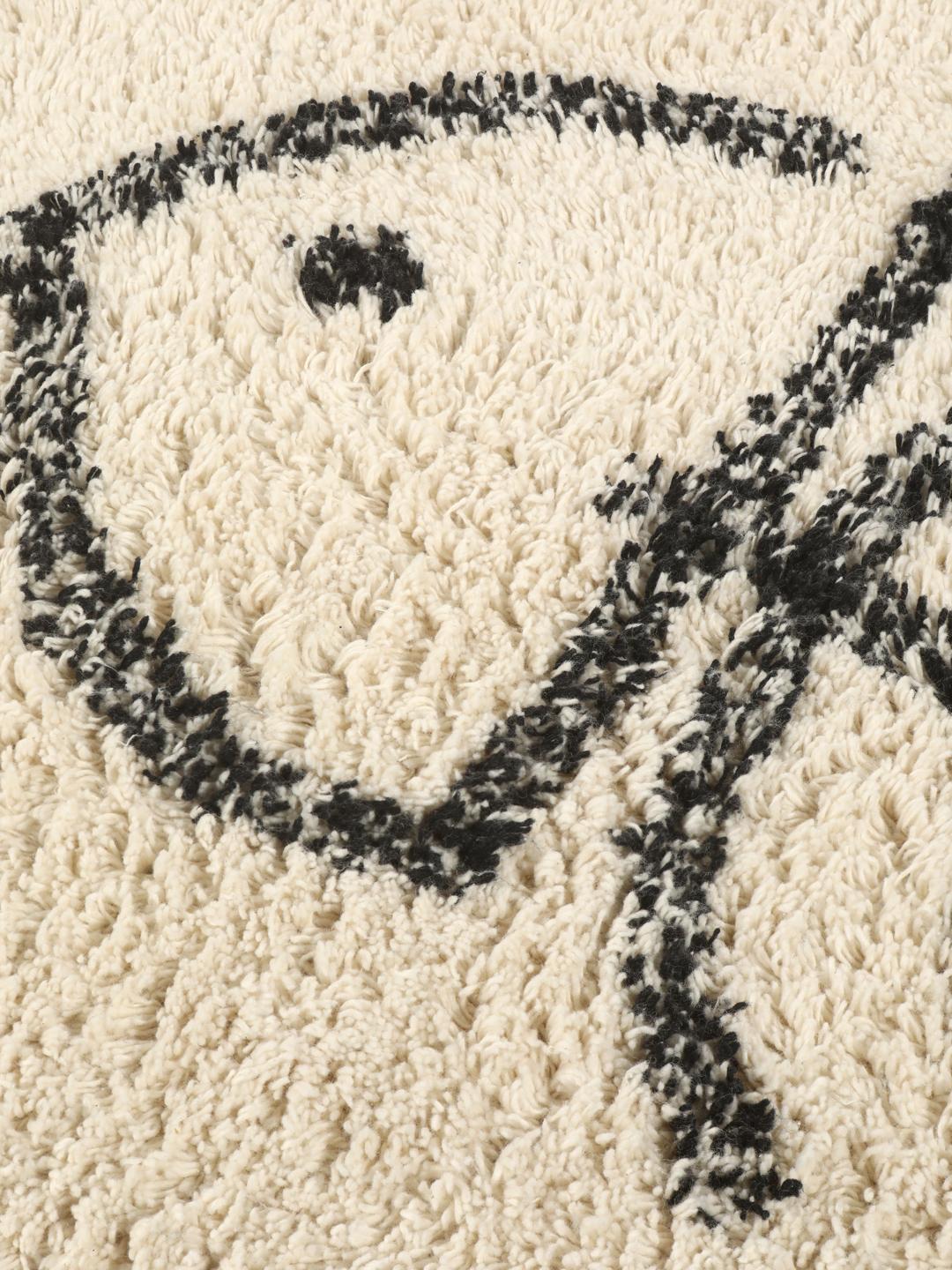 Tapis de bain en coton blanc et noir avec un motif d'arêtes de poisson
