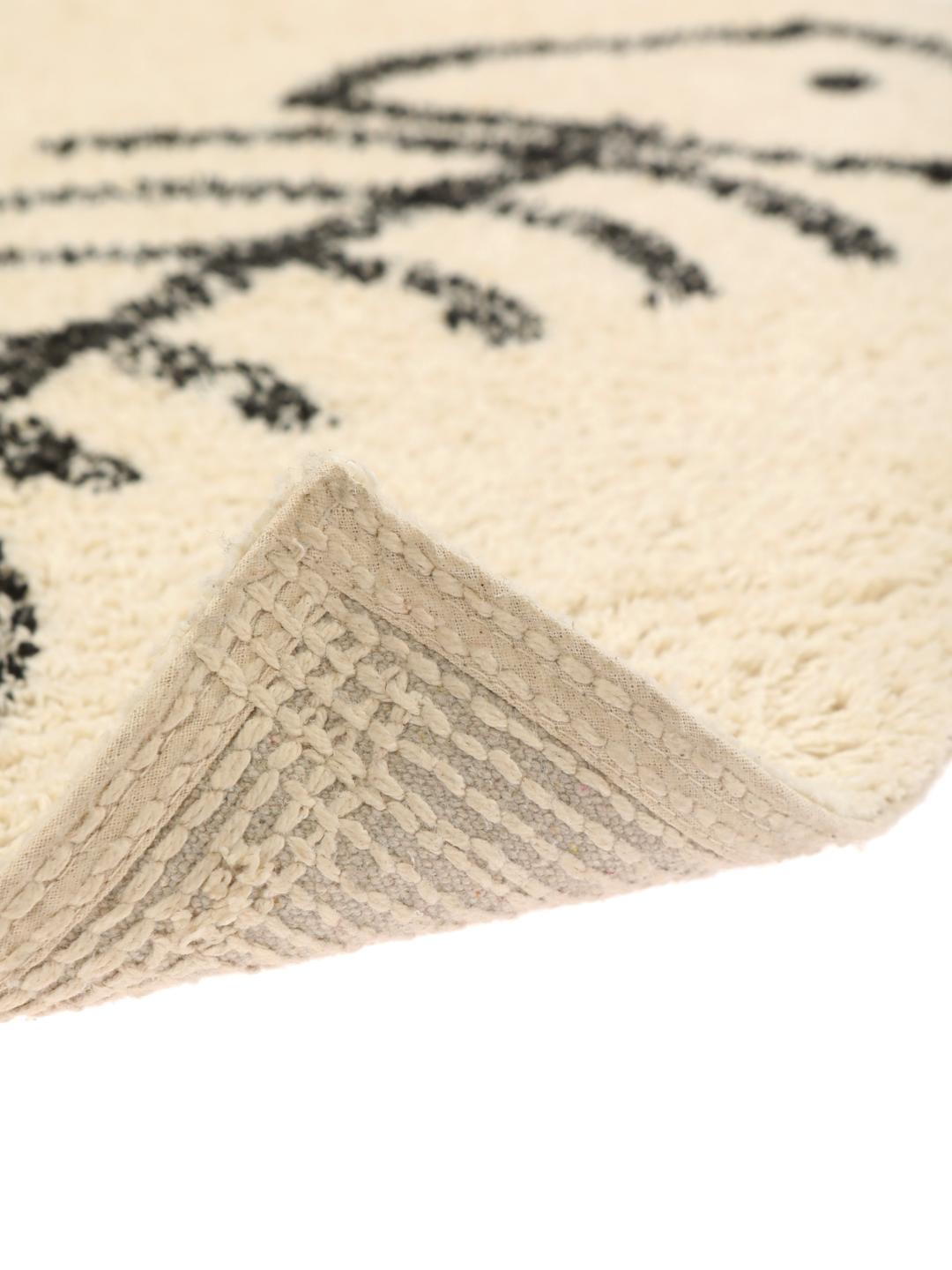 Tapis de bain en coton blanc et noir avec un motif d'arêtes de poisson