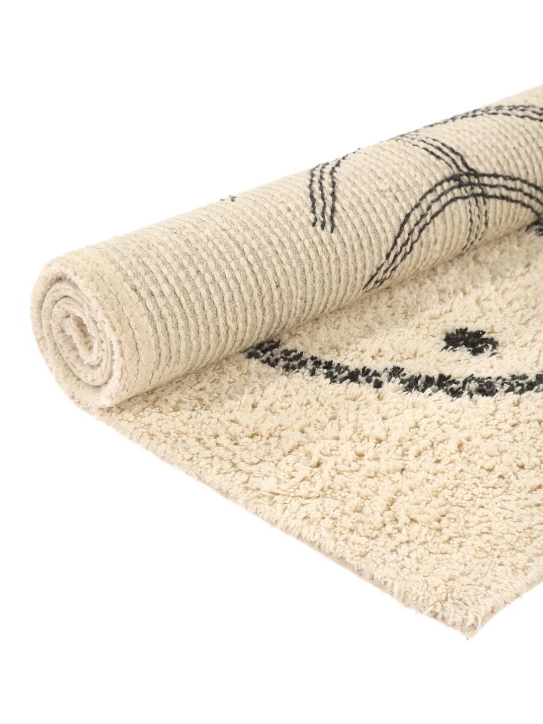 Tapis de bain en coton blanc et noir avec un motif d'arêtes de poisson