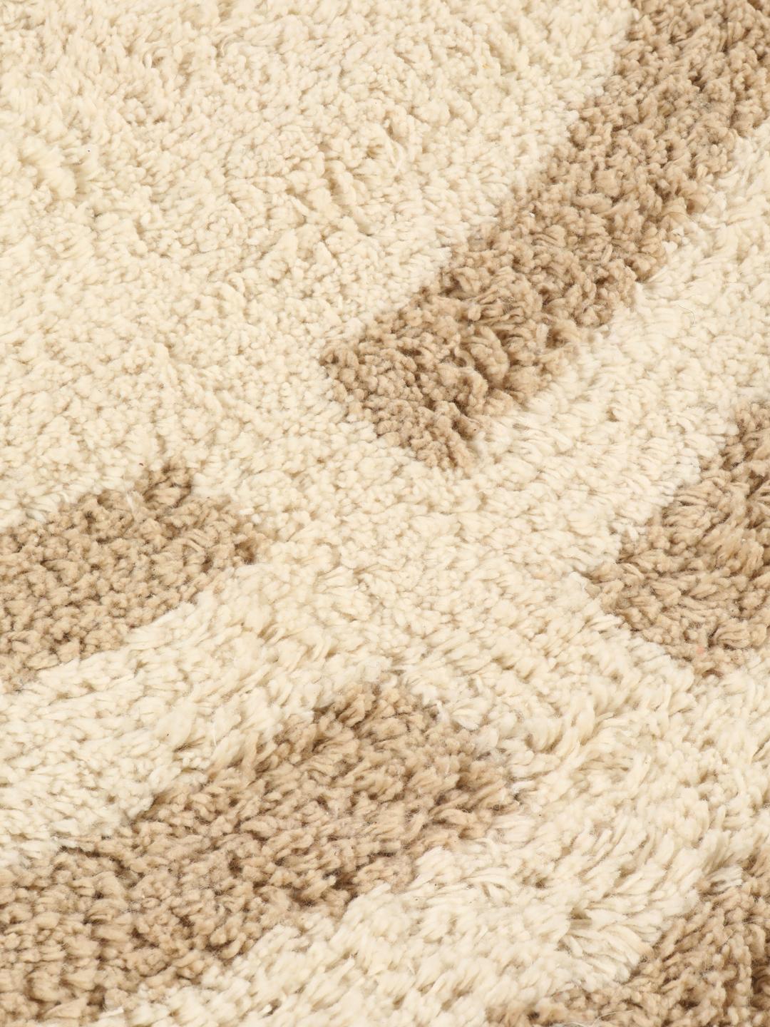 Tapis de bain rond beige avec motif circulaire