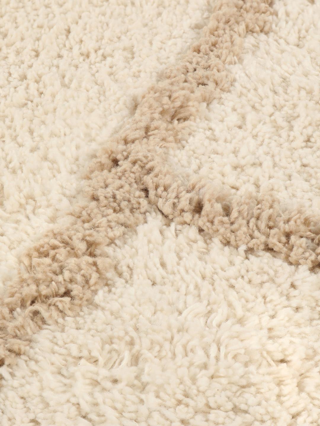 Beige badeværelsesmåtte med geometrisk design og kvaster