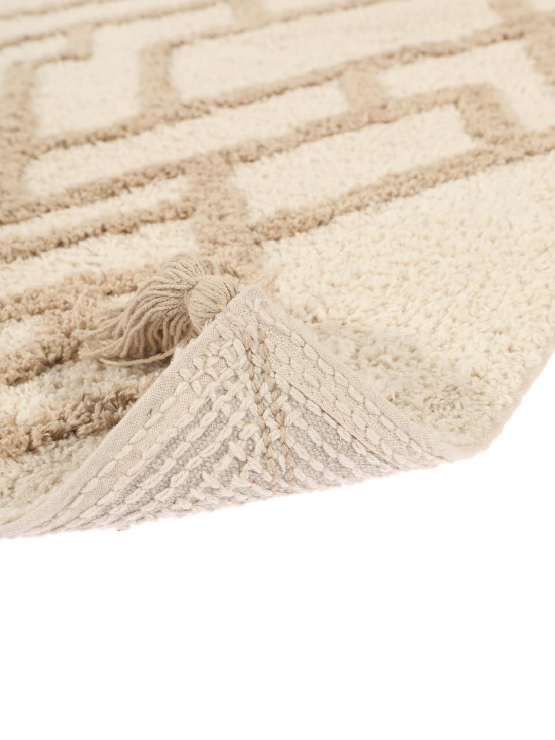 Beige badeværelsesmåtte med geometrisk design og kvaster