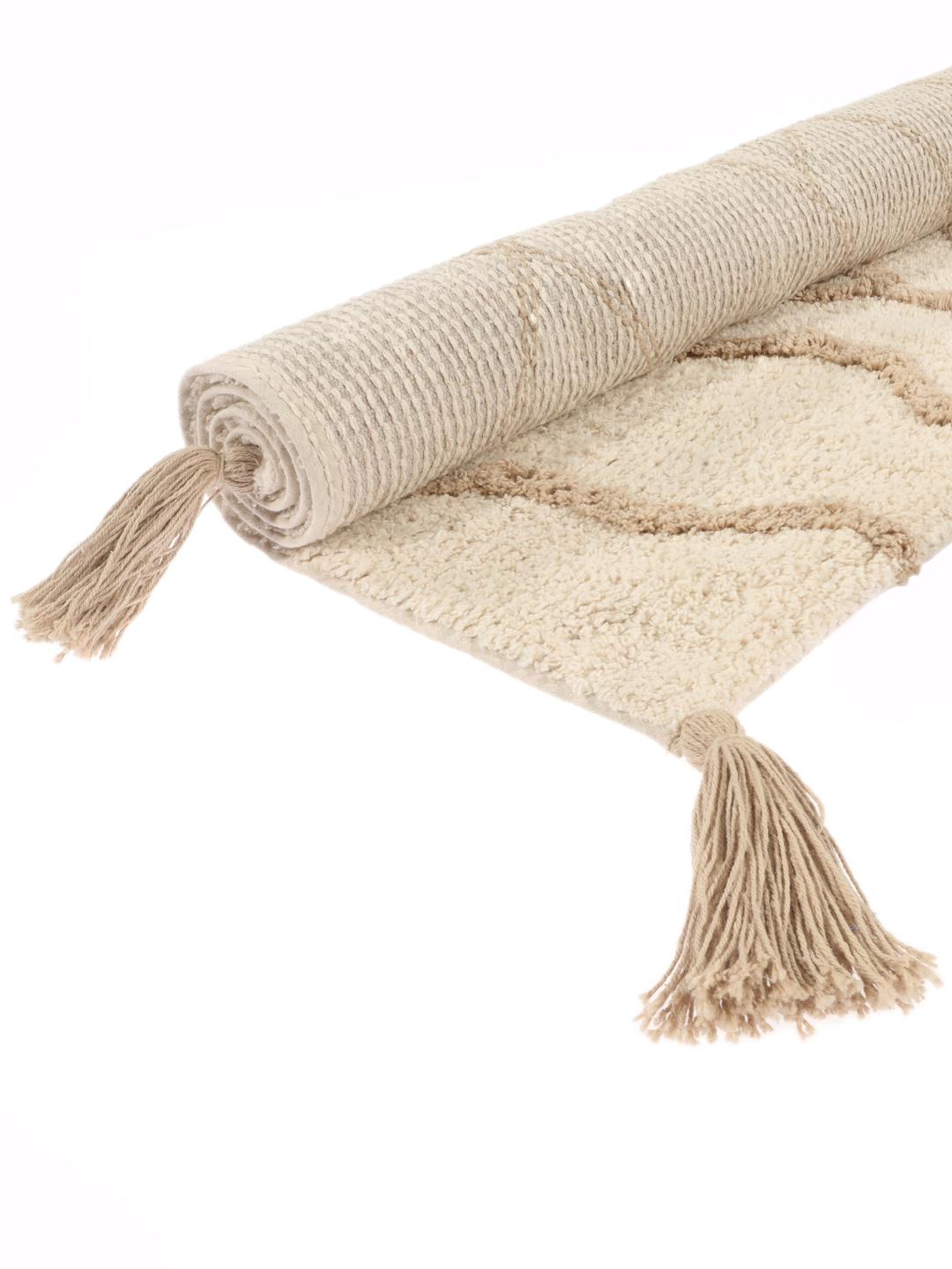 Beige badeværelsesmåtte med geometrisk design og kvaster