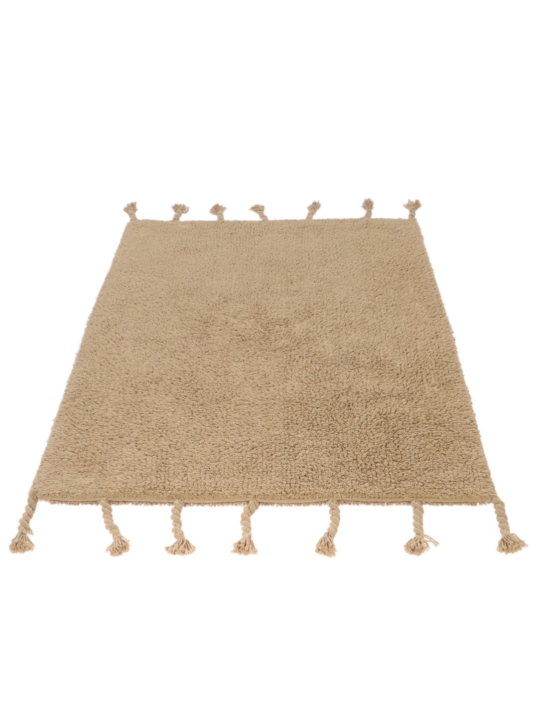 Beige bademåtte med frynsedetaljer
