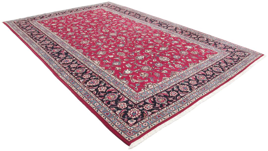 Handgeknoopt Keshan wollen vloerkleed in rood en donkerblauw