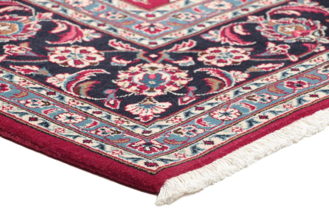 Handgeknoopt Keshan wollen vloerkleed in rood en donkerblauw