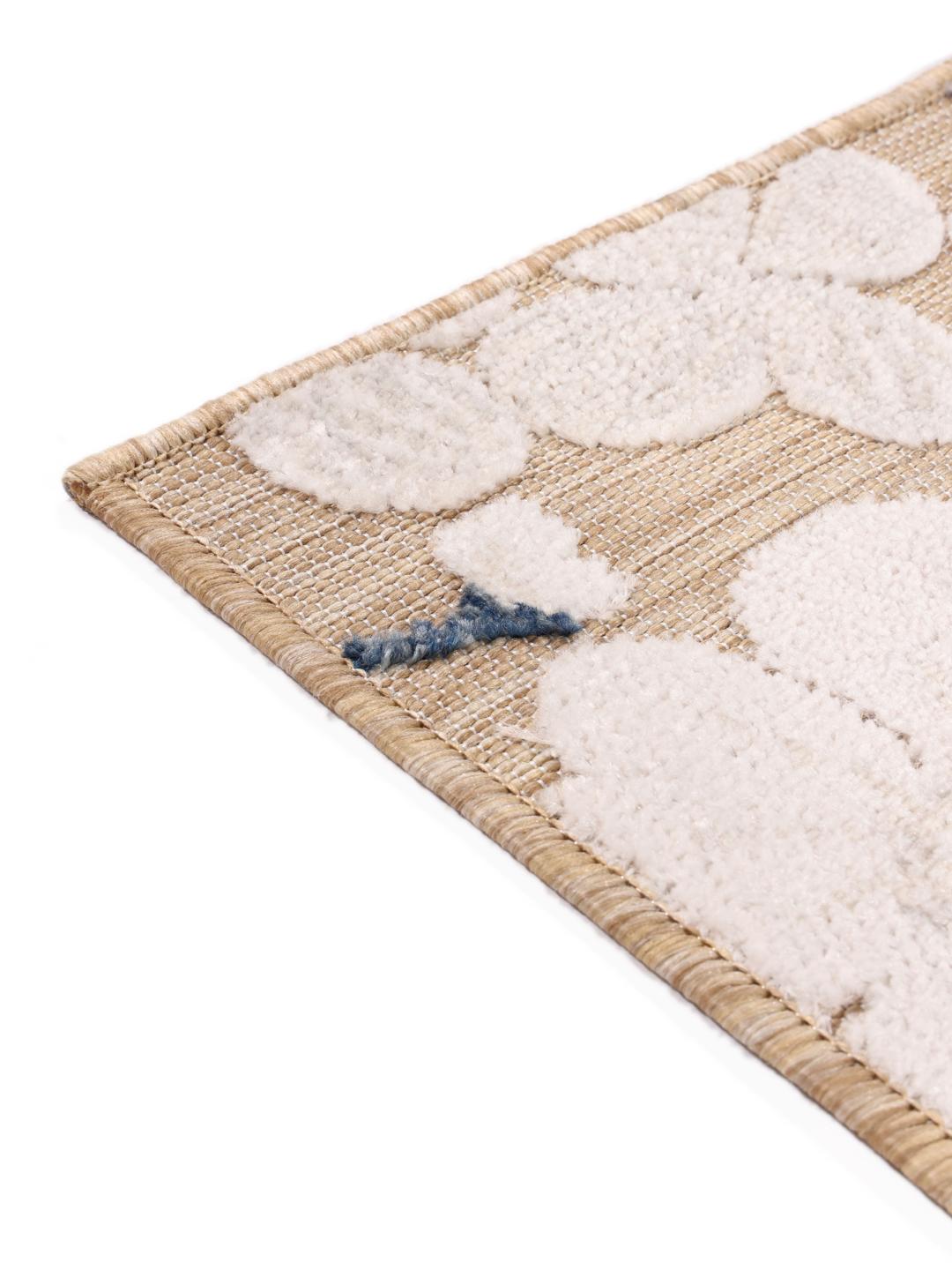 Tapis beige avec motif floral