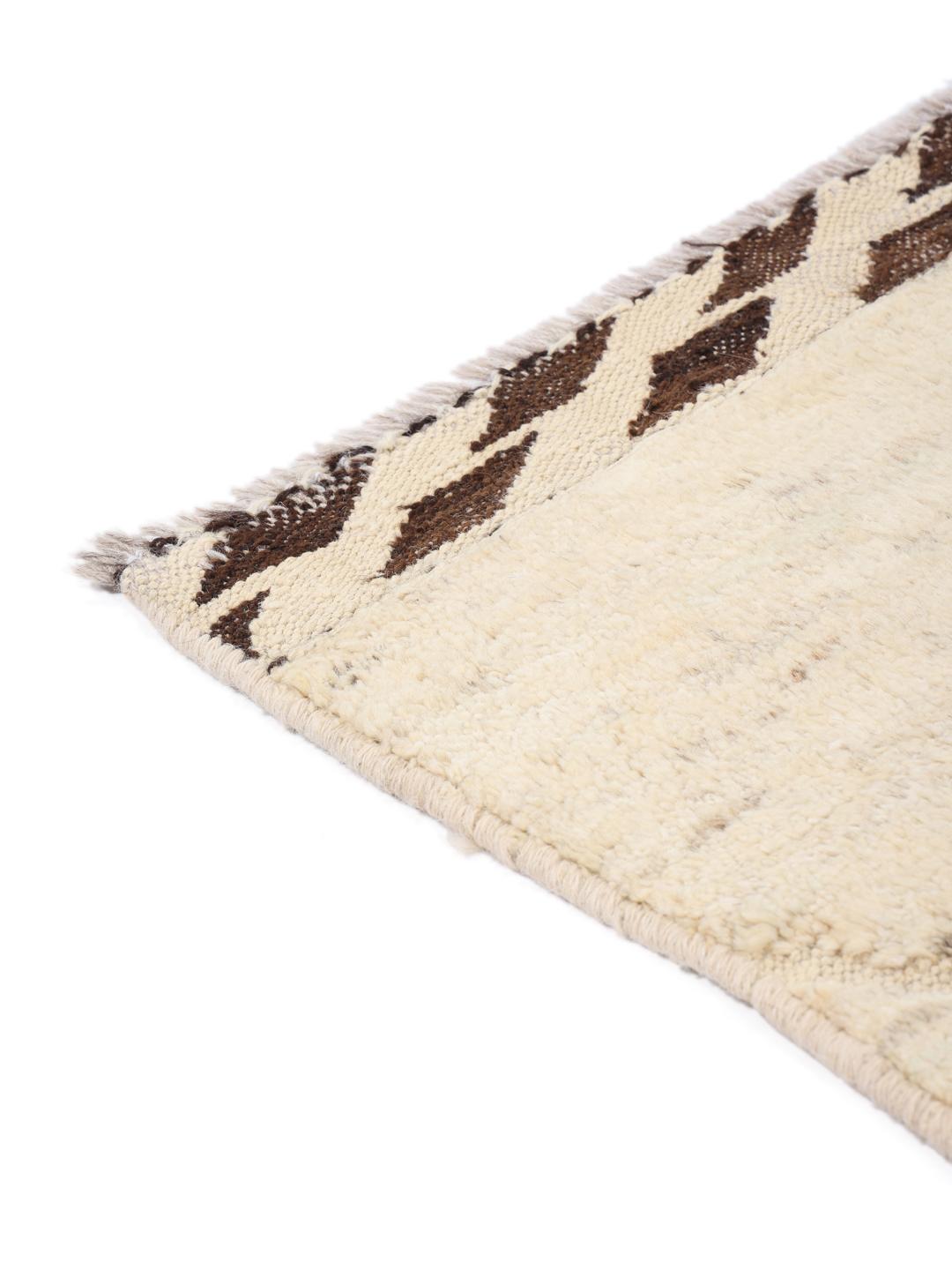Handmade Berber style rug from Afghanistan in beige with a diamond pattern