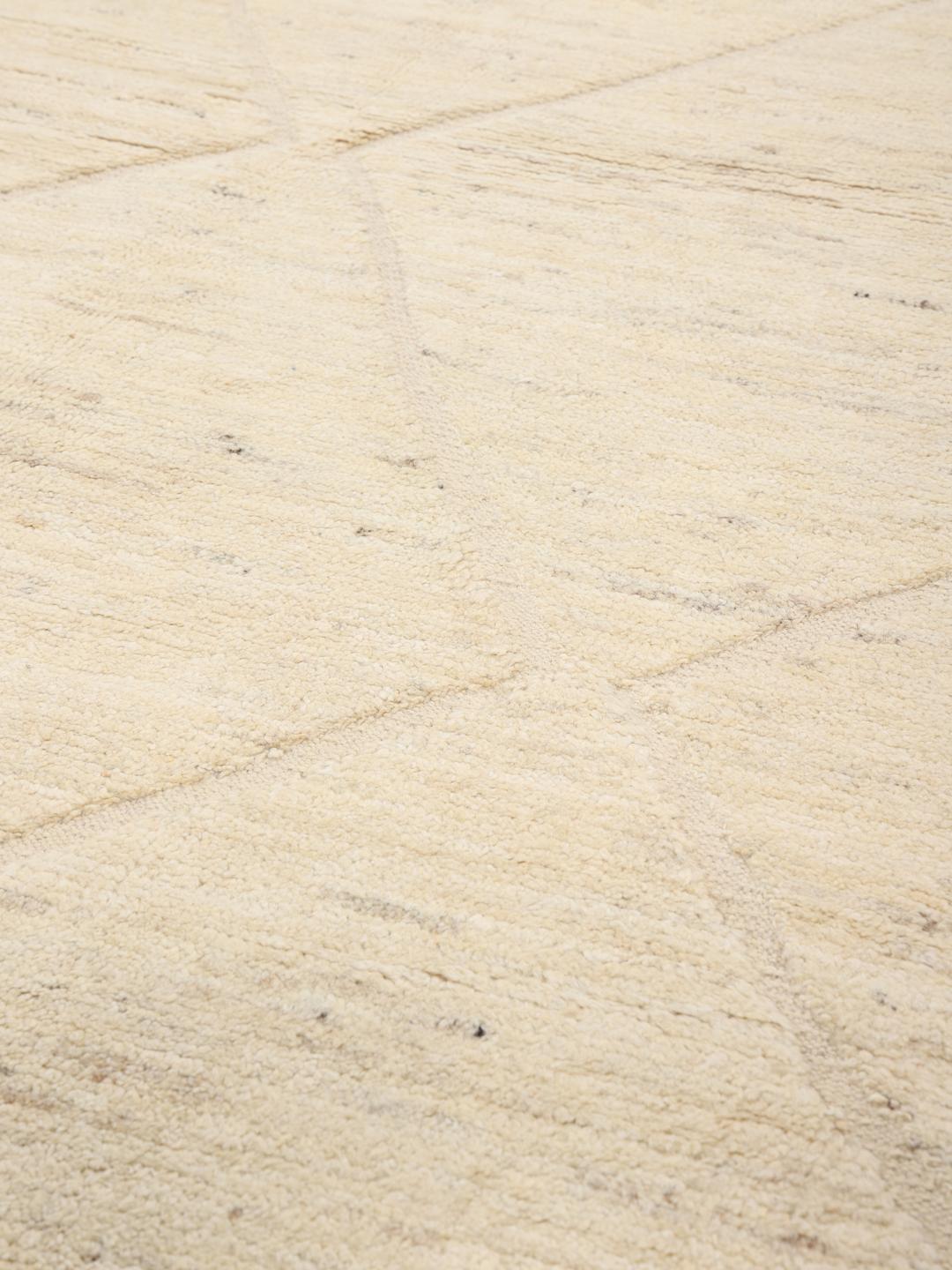 Handmade Berber style rug from Afghanistan in beige with a diamond pattern